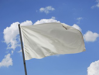White flag waving on the wind. Put your own text